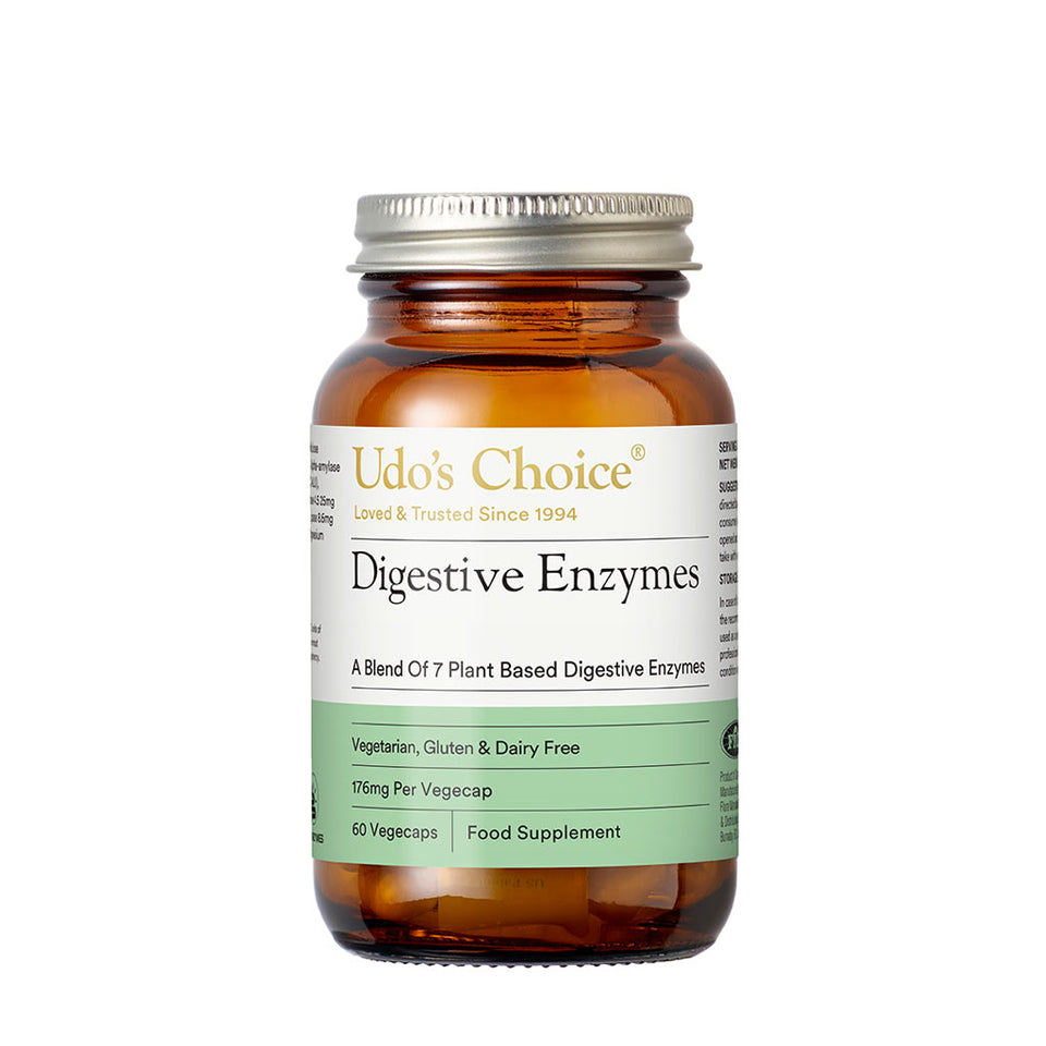 A bottle of Udo's Choice Digestive Enzymes, a dietary supplement designed to aid digestion with plant-based enzymes.