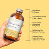 Hand holding a bottle of Udo's Choice Ultimate Oil Blend with text highlighting its features on a yellow background.