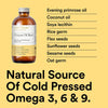 Bottle of Udo's Choice Ultimate Oil Blend with a list of ingredients on a yellow background